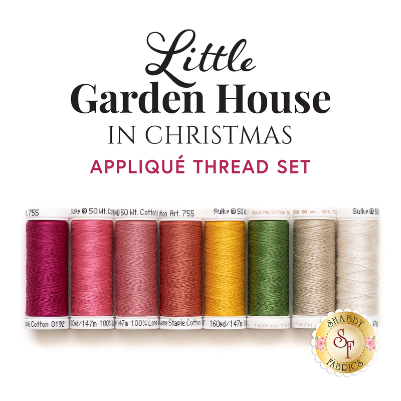 Eight spools of thread that coordinate with the Little Garden House in Christmas kit, arranged in rainbow order, isolated on a white background below a text graphic.