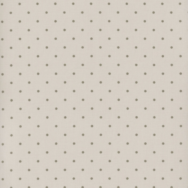 Light gray fabric with darker polka dots.