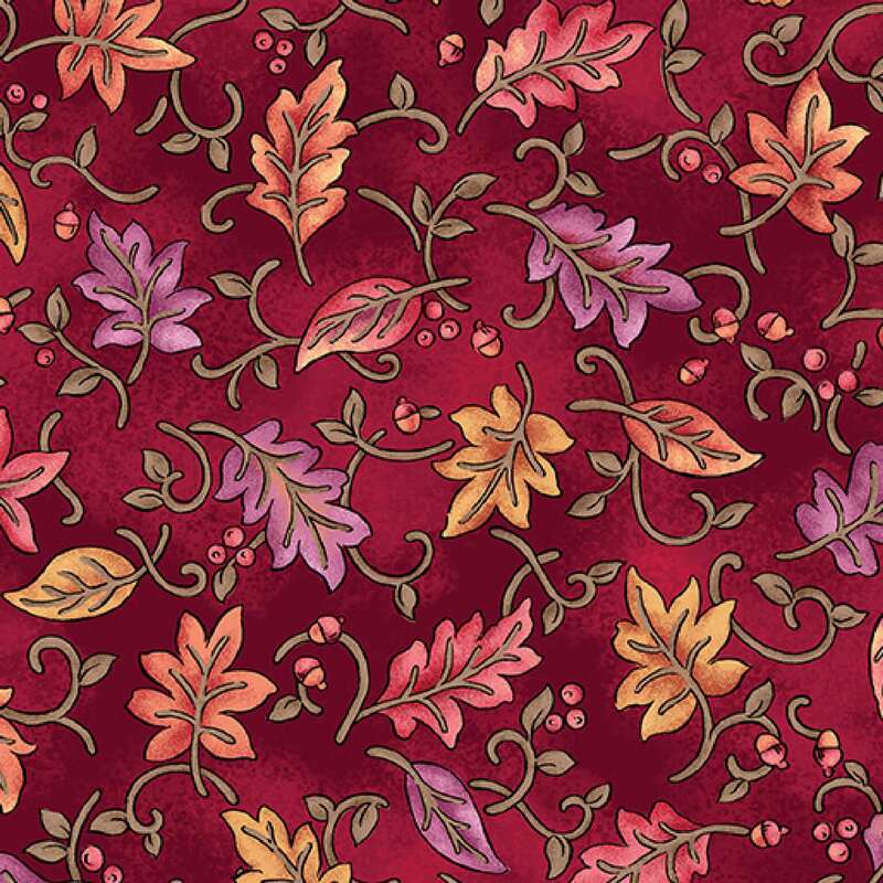 A rich burgundy fabric featuring a decorative pattern of colorful autumn leaves and swirls.