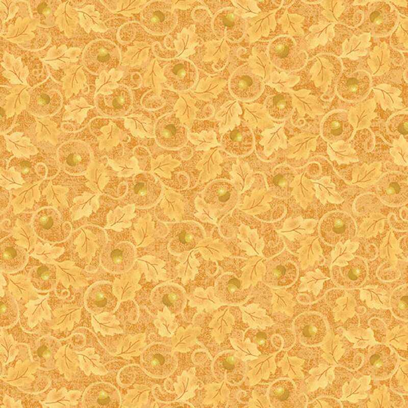 Golden-patterned fabric featuring intricate swirls, leaves, and small acorn accents.