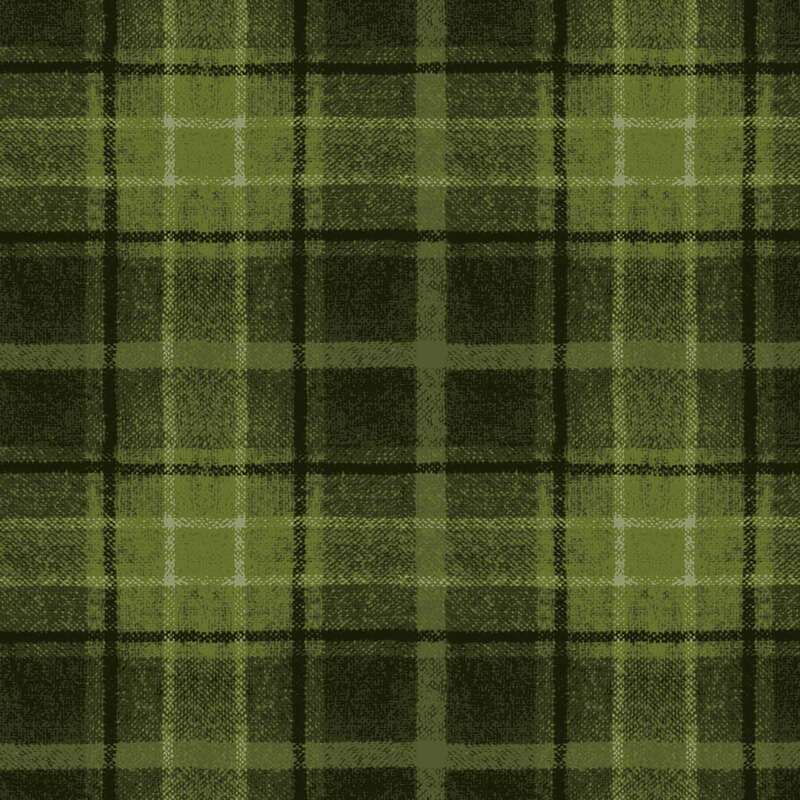 Green plaid fabric pattern featuring varying shades of green with black lines.