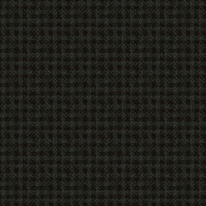 Dark plaid textile pattern with thin lines intersecting in a grid design.