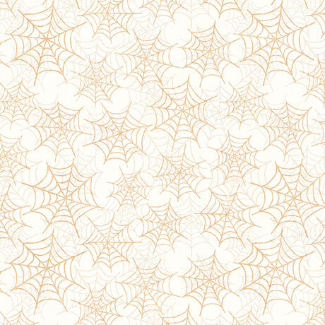 Cream fabric featuring a spiderweb design