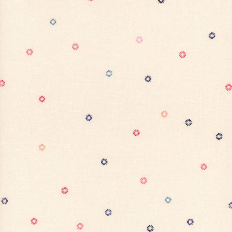 A pattern of scattered multicolored floral shapes on a cream background.