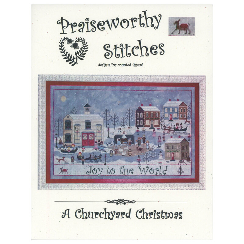 Front of the A Churchyard Christmas cross stitch pattern showing the finished project hung in a white frame.