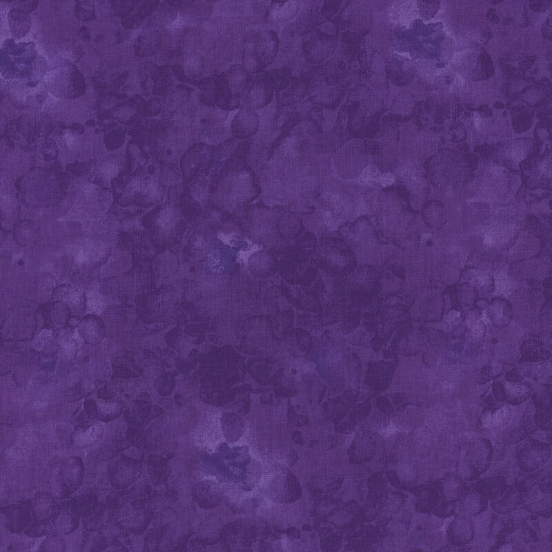 Abstract texture in various shades of purple with soft, blurred patterns throughout.