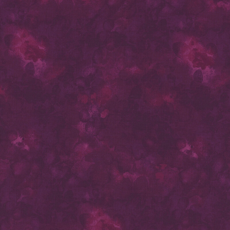 Abstract pattern of deep purple and magenta hues with soft, blended textures.