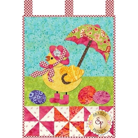 Little chick wearing a pink hat and carrying a green paisley umbrella on a blue-green background.