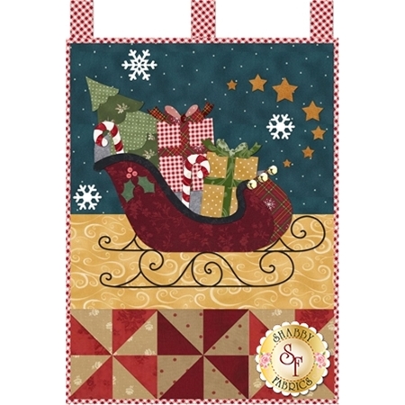 Red sleigh filled with gifts, Christmas tree, and candy canes.