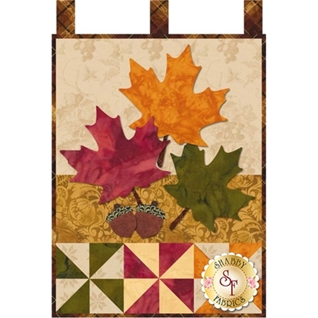 Red, yellow, and green maple leaf appliques with a pair of acorns.