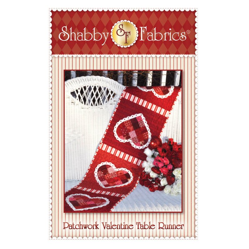 The front of the Patchwork Valentine Table Runner pattern by Shabby Fabrics