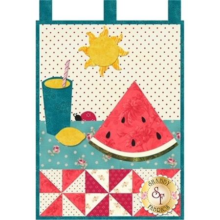 Slice of watermelon, ladybug, and glass of lemonade applique wall hanging.