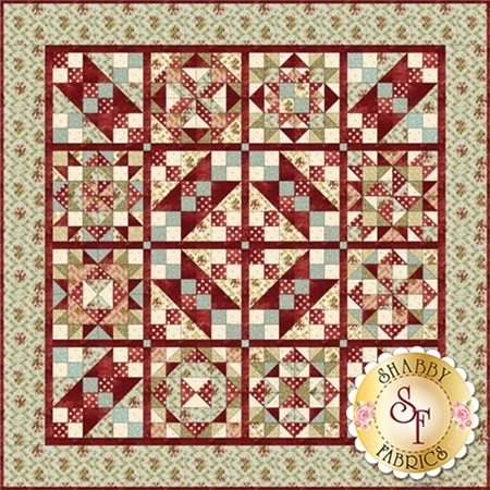 Burgundy and pale green pieced quilt featuring a variety of patchwork blocks.