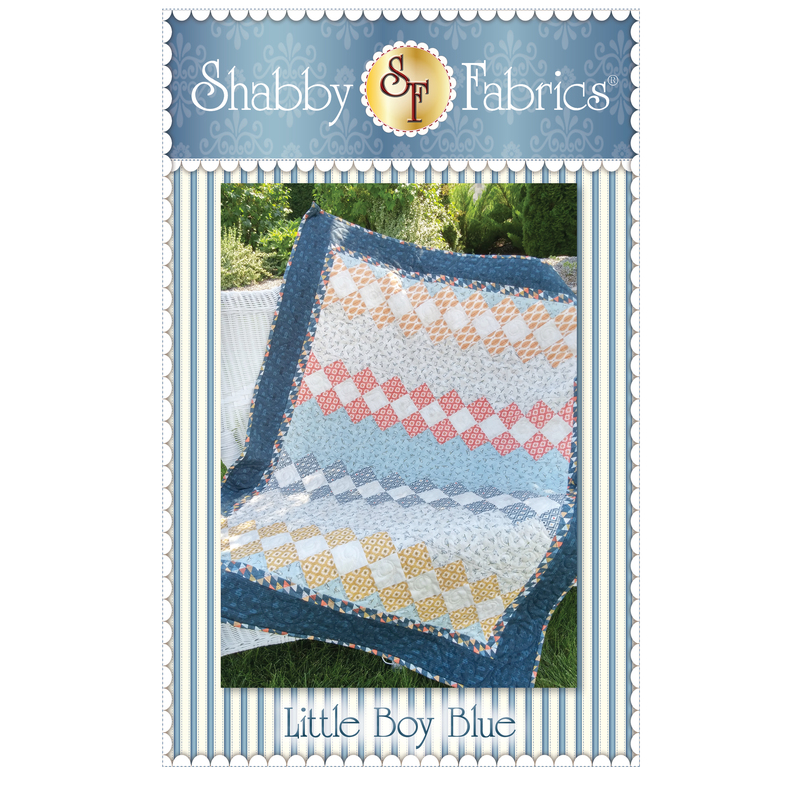 The front of the Little Boy Blue quilt pattern by Shabby Fabrics showing the finished quilt.