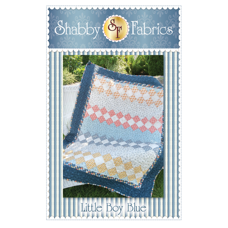 The front of the Little Boy Blue Quilt pattern by Shabby Fabrics showing the finished project.