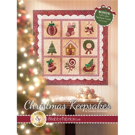 Christmas Keepsakes Book by Jennifer Bosworth of Shabby Fabrics showing the finished quilt hung on a wall.