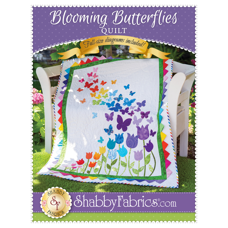Blooming Butterflies Quilt Pattern front cover showing an array of tulips small to large with butterflies large to small emerging from the large tulips.
