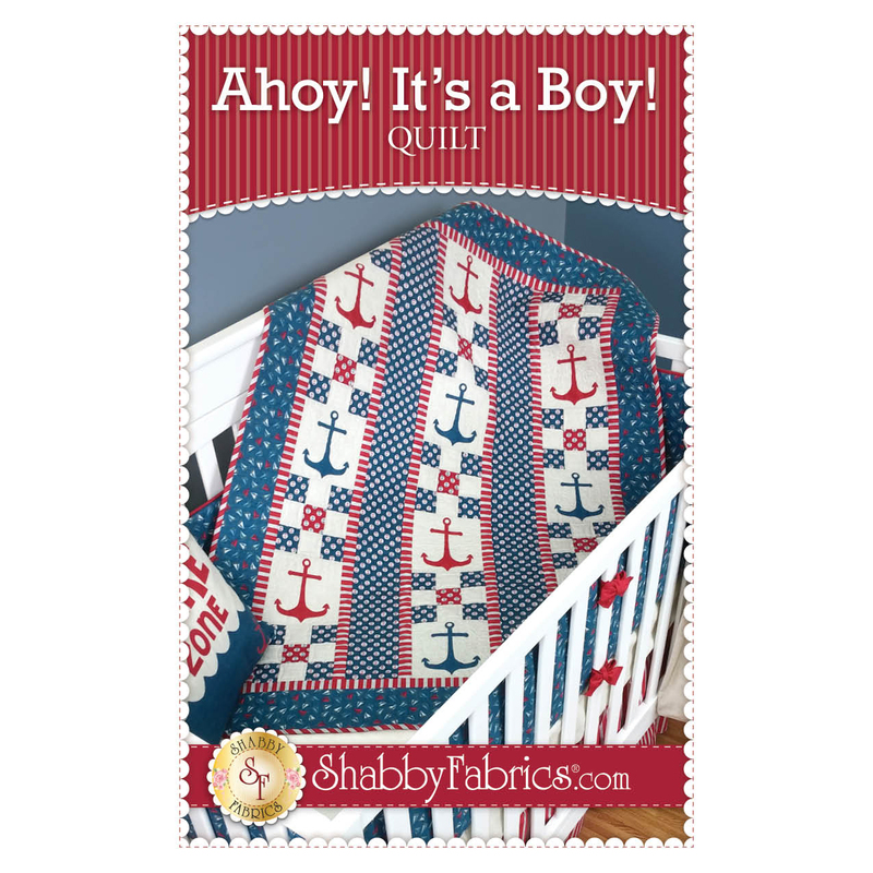 The front of the Ahoy! It's a Boy! Quilt pattern by Shabby Fabrics showing the finished quilt with 9-patch blocks, and anchor applique blocks.