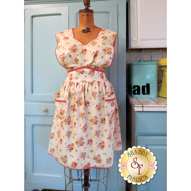 The finished Anna Vintage Apron on a dress form.
