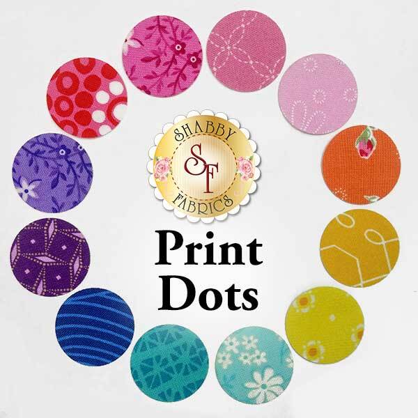 12 circle applique shapes in a rainbow of print fabrics.