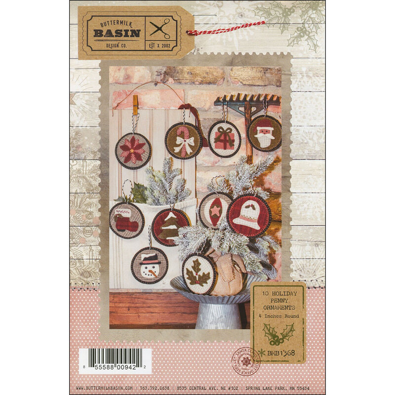 10 Holiday Penny Ornaments Pattern front cover showing all 10 finished ornaments including a poinsettia, a candy cane, a gift, Santa, Santa's boot, a snowy tree, a snowman, a christmas bell, an ornament with a star, and holly leaves with berries.