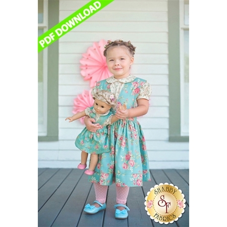 An image of a little girl wearing the Elizabeth and Eden Ensemble.