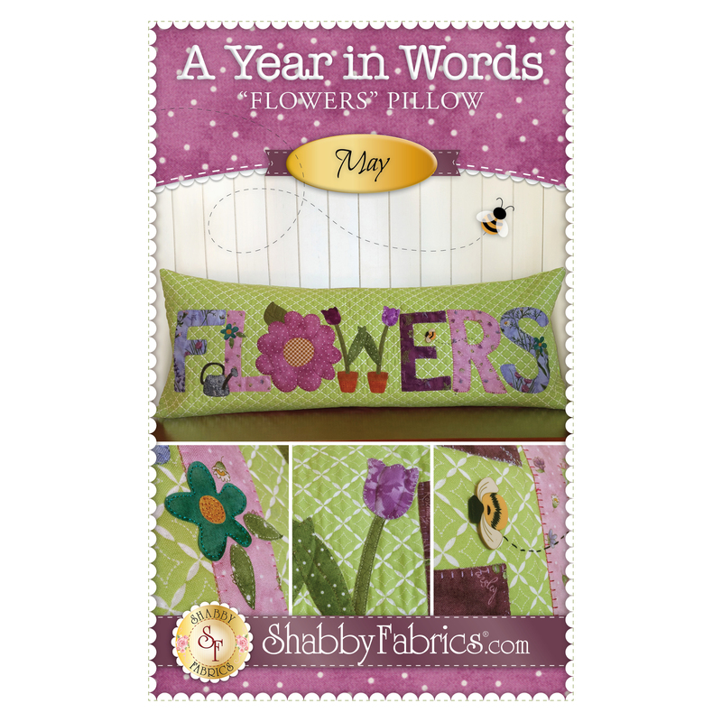 Pattern for May A Year In Words pillow reading Flowers with purple flowers on green fabric.