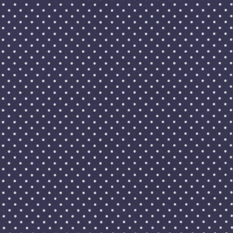 navy blue fabric with little white polka dots