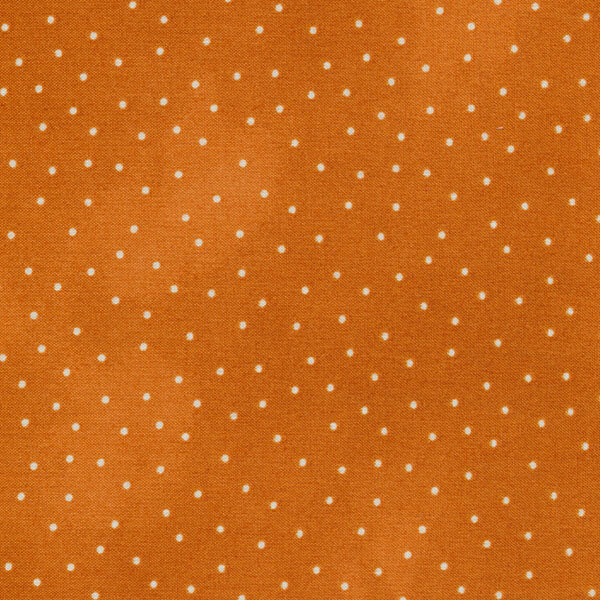 Fabric features cream scattered pin dots on mottled dark orange | Shabby Fabrics