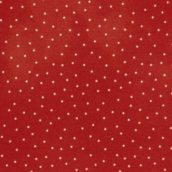 Fabric features cream scattered pin dots on mottled red | Shabby Fabrics