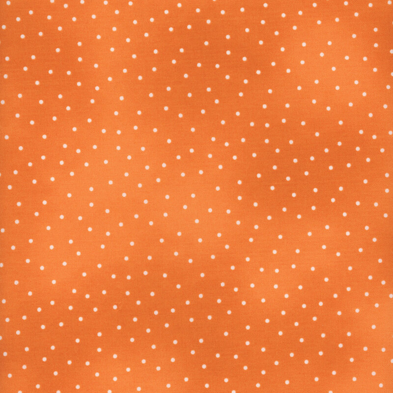Fabric features cream scattered pin dots on mottled orange | Shabby Fabrics