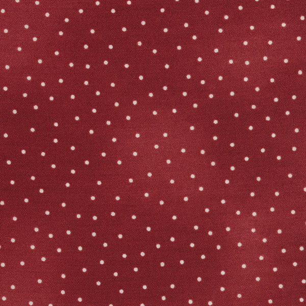 Fabric features cream scattered pin dots on mottled crimson red | Shabby Fabrics