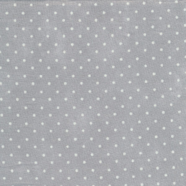 Fabric features tiny cream polka dots on mottled light gray | Shabby Fabrics