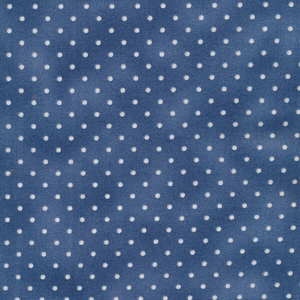 Fabric features tiny cream polka dots on mottled light navy blue | Shabby Fabrics