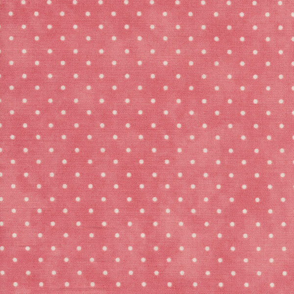 Fabric features tiny cream polka dots on mottled pink | Shabby Fabrics