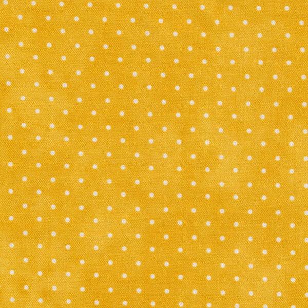 Fabric features tiny cream polka dots on mottled mustard yellow | Shabby Fabrics