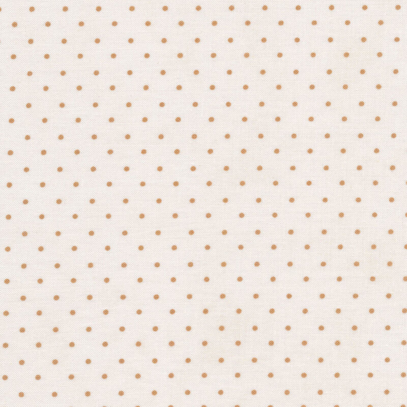 Fabric featuring tiny tan polka dots on cream