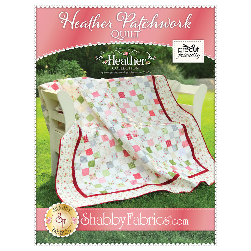 The front of the Heather Patchwork Quilt pattern by Shabby Fabrics showing the finished quilt.