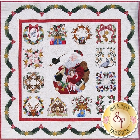 An image of the Baltimore Christmas finished quilt featuring a Santa in the center, block of festive holiday applique, and an outer border full of holly & berries.