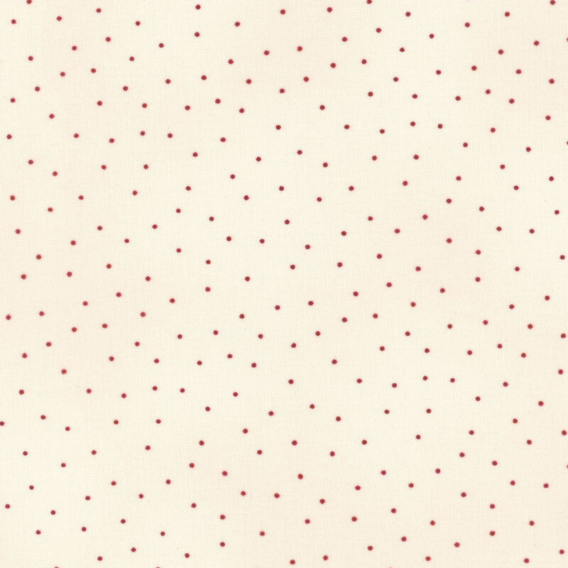 Cream fabric with red scattered pin dots