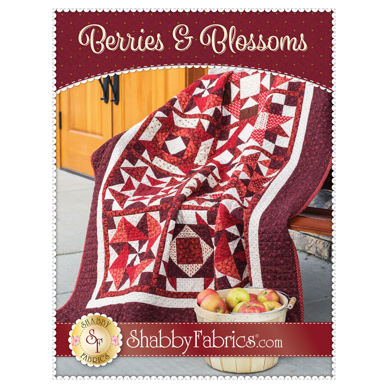 The front of the Berries & Blossoms Quilt pattern by Shabby Fabrics showing the finished project.