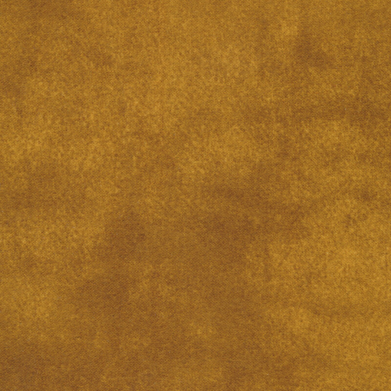 Mottled golden brown flannel fabric