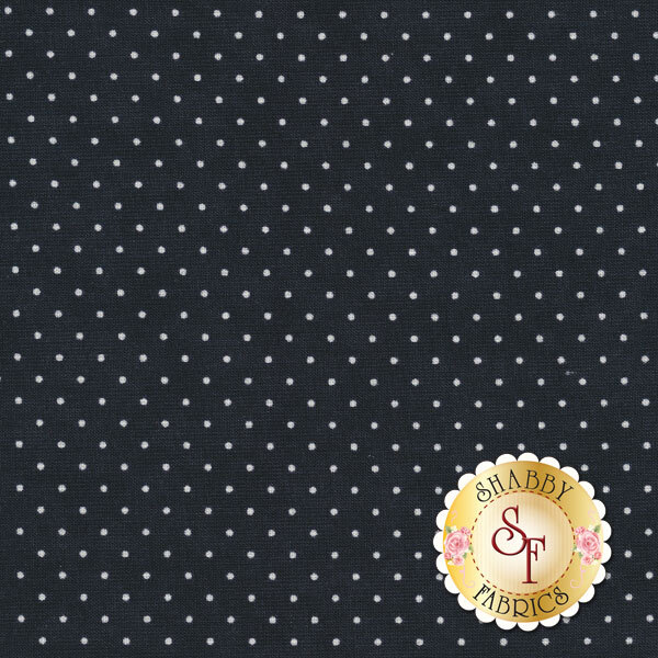 This Moda fabric features a jet black background with white polka dots