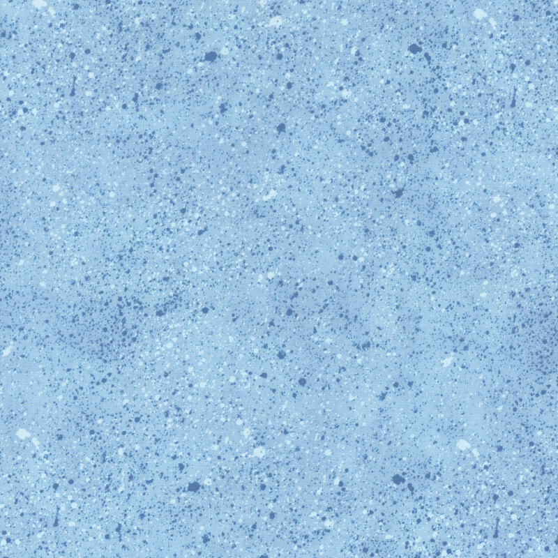 Sky blue tonal fabric with scattered dark blue and baby blue textures
