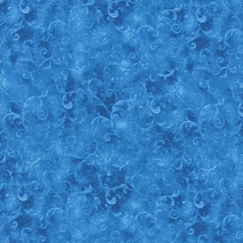 bright blue fabric with sprawling scroll designs