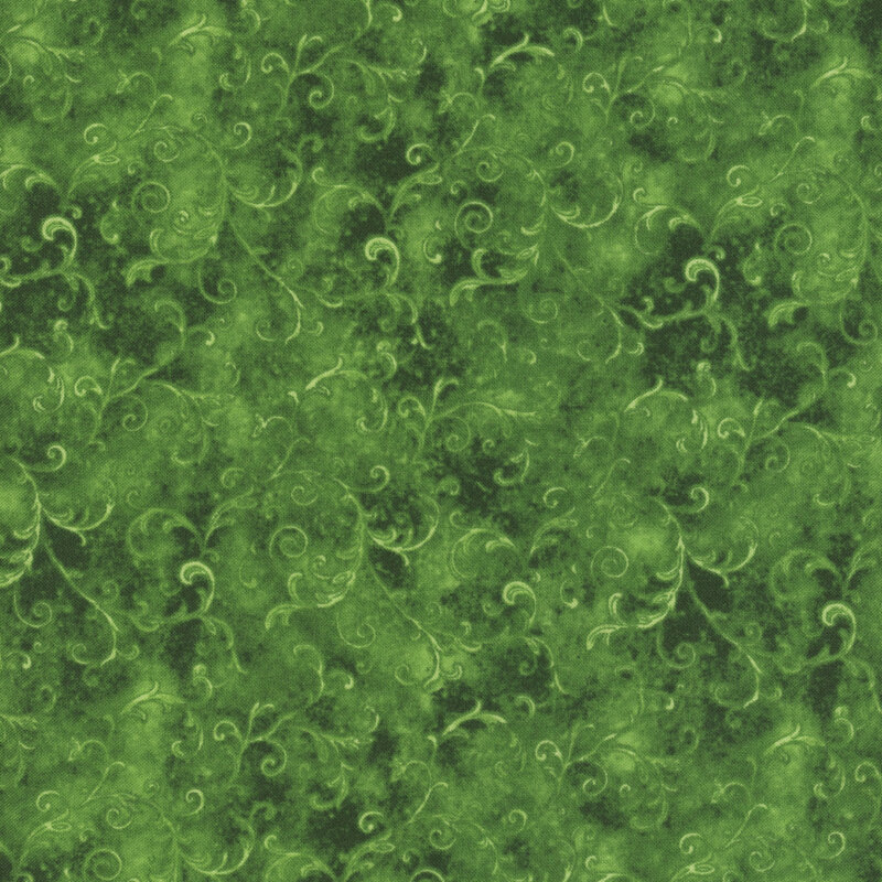 green fabric with sprawling scroll designs