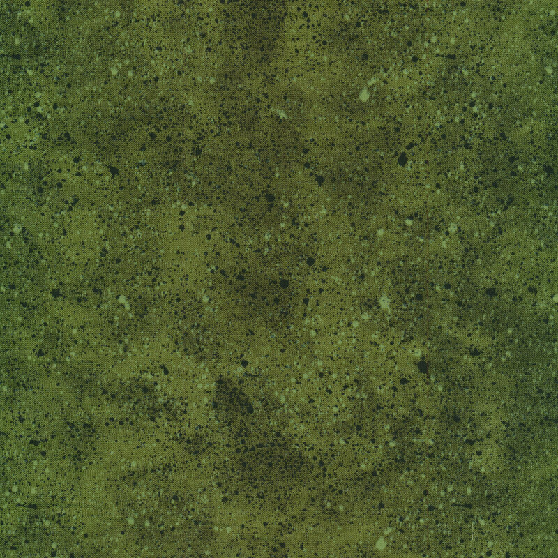 Green tonal fabric with splatter marks