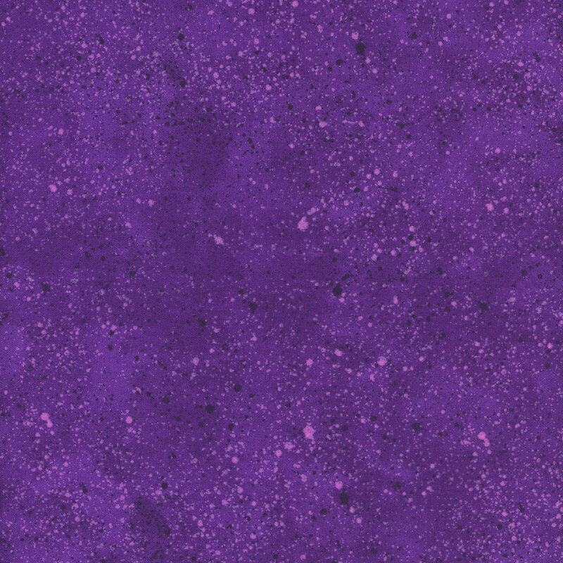 dark purple fabric with speckled deep and light purple spots 