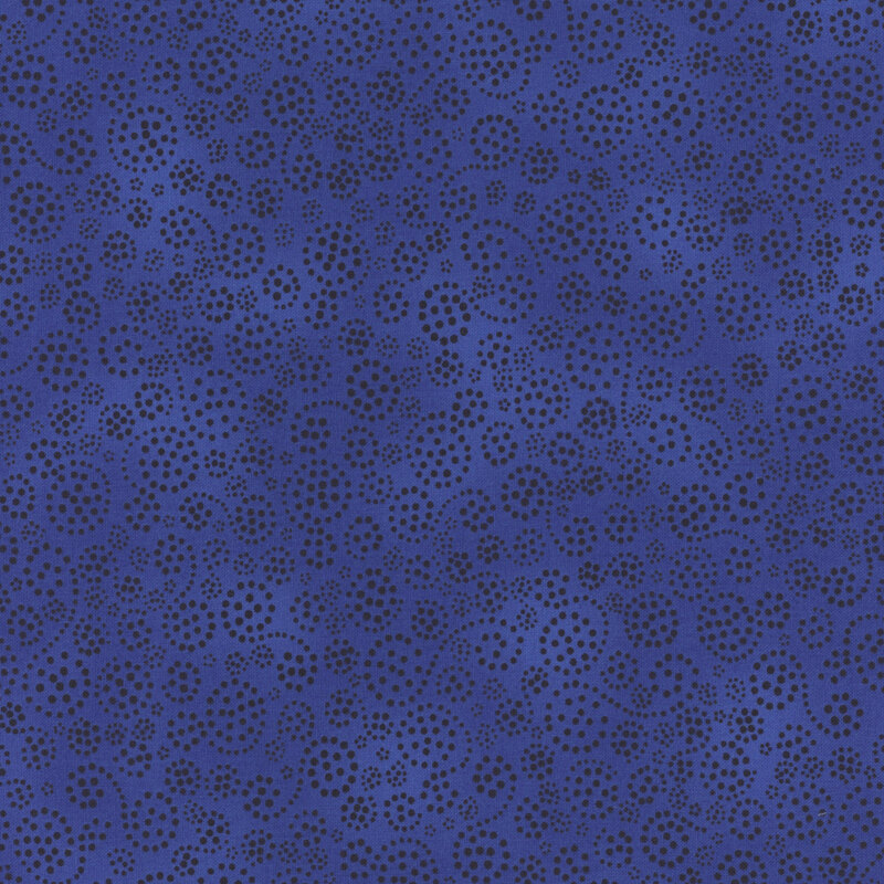 royal blue fabric featuring dotted swirls