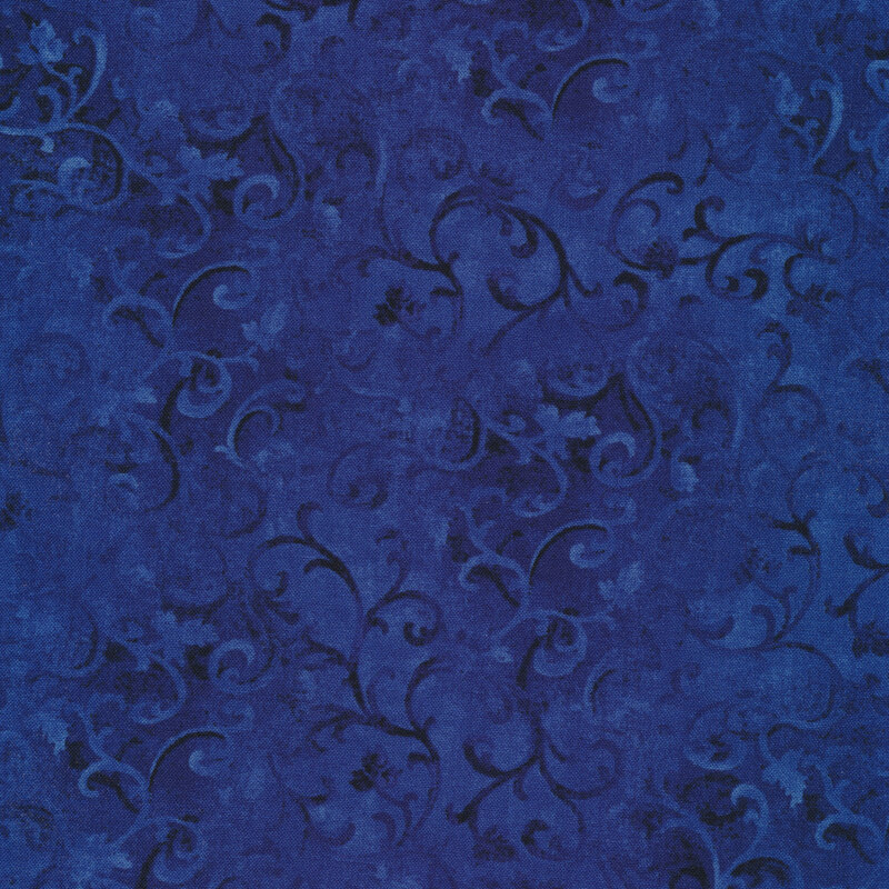 blue mottled fabric with tonal swirls across it